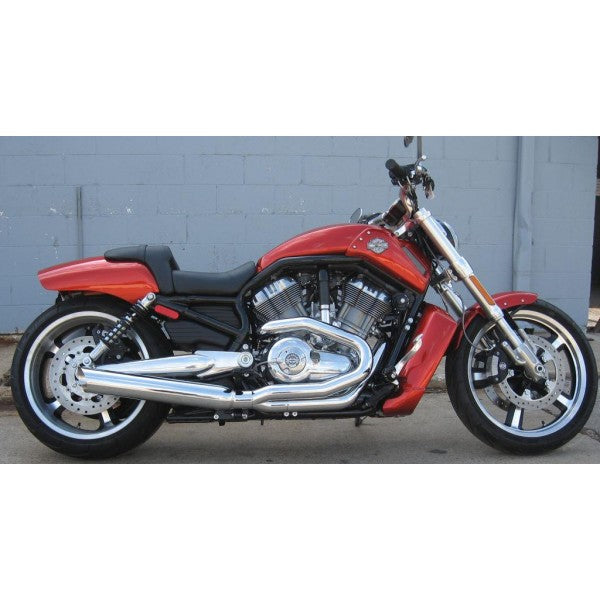 Red motorcycle parked against a gray wall