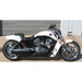 White motorcycle with black seat parked on a concrete surface.