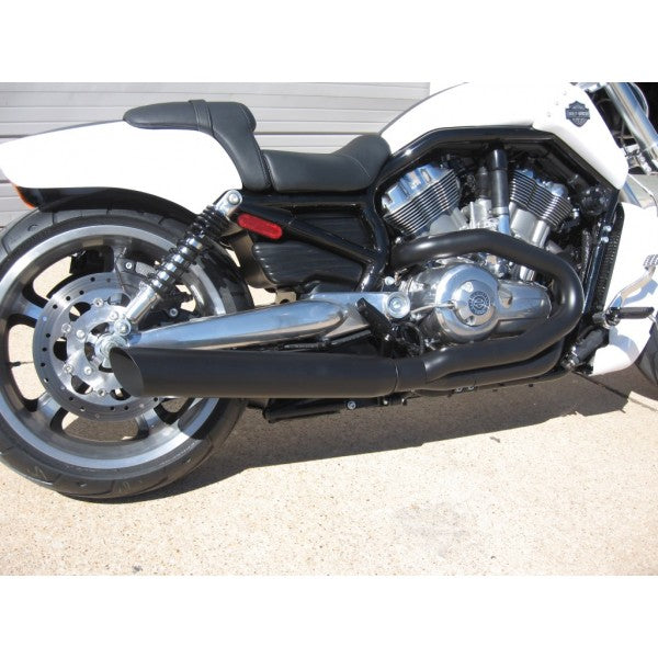 Side view of a motorcycle with a visible engine and exhaust system.
