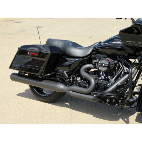 Black motorcycle parked on a concrete surface
