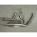 Set of chrome exhaust pipes on a gray surface