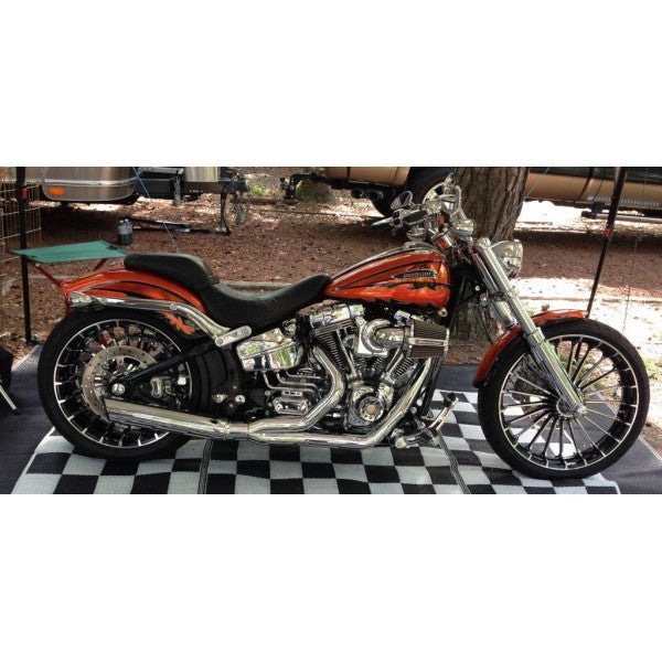 Motorcycle on a checkered floor with a blurred background