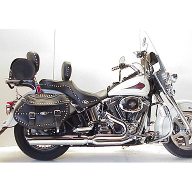 Harley Davidson motorcycle with leather saddlebags on a white background