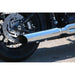Close-up of a motorcycle's exhaust and wheel on a white background