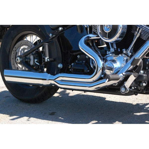Close-up of a motorcycle's exhaust system on a white background