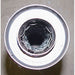 Metallic bearing with a central bore on a gray background