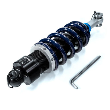 Shock absorber with a tool on a white background
