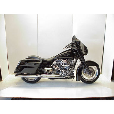 Black motorcycle on a white platform with a white background