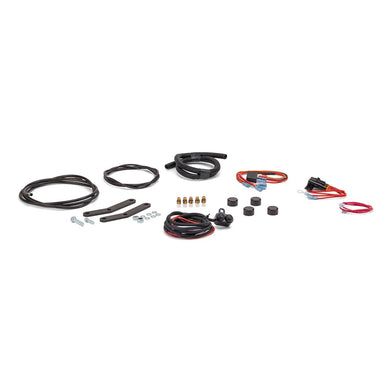 Collection of automotive wiring harnesses and connectors on a white background
