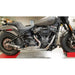 Harley Davidson motorcycle on a lift in a garage setting