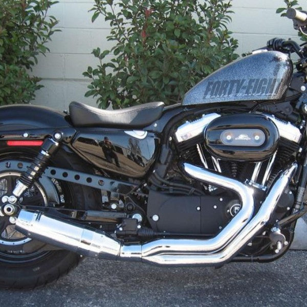 Black motorcycle with 'Forty-Eight' branding parked outdoors.