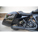 Black motorcycle with a visible exhaust pipe on a white background